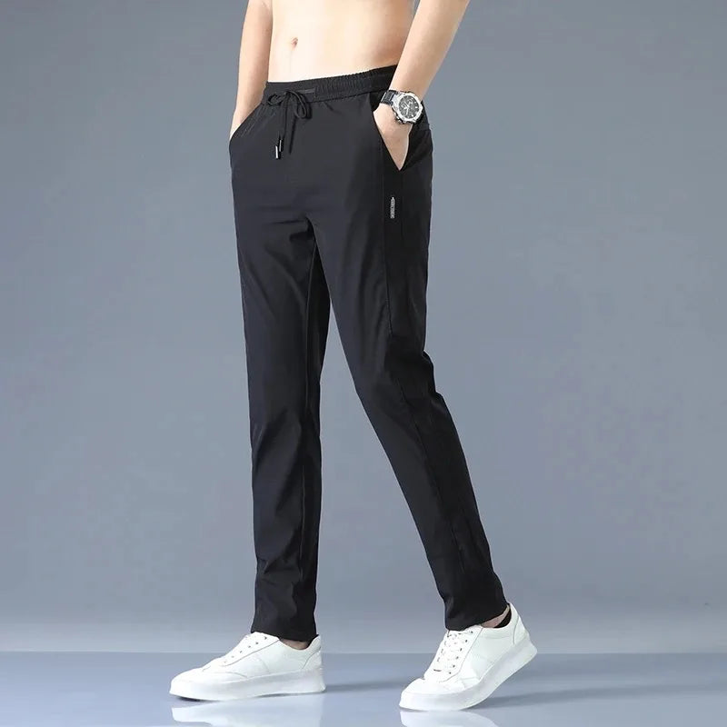 Men's New Casual Pants Fashion Stretch Straight Slim Pants Hong Kong Wind Ice Silk Loose Everything Trend Foreign Jogging Pants