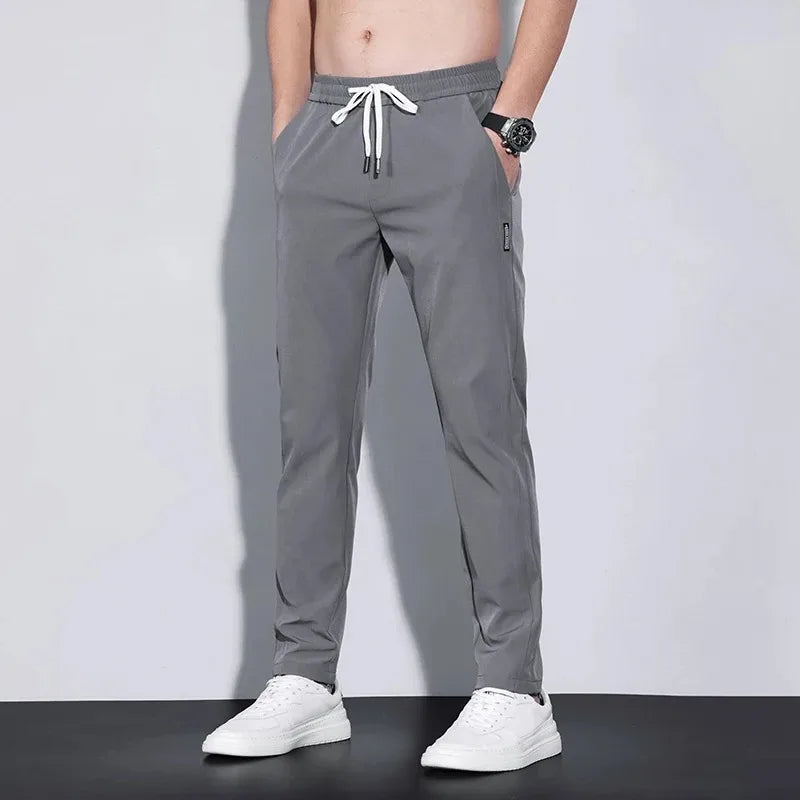 Men's New Casual Pants Fashion Stretch Straight Slim Pants Hong Kong Wind Ice Silk Loose Everything Trend Foreign Jogging Pants